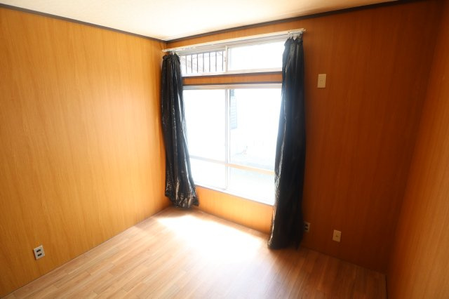 マンション甘樫の洋室