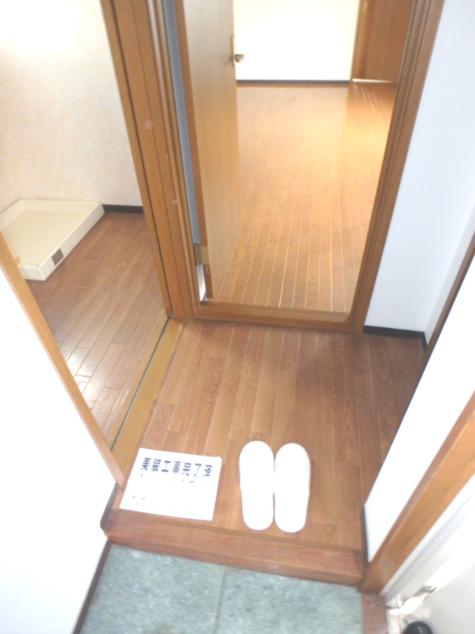 神戸市北区有野中町３丁目のマンションの玄関