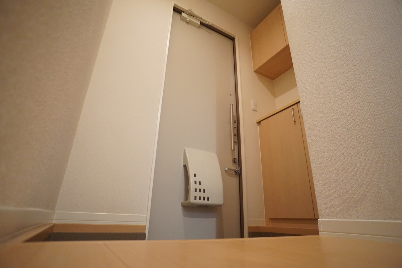 グランドゥールいずみの玄関