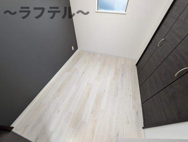 狭山市中央４丁目のアパートの居間・リビング