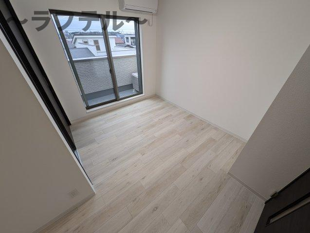 狭山市中央４丁目のアパートの居間・リビング