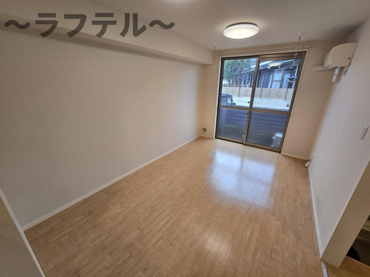 所沢市大字久米のアパートの居間・リビング