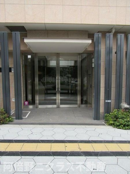 エス・キュート上本町イーストのエントランス