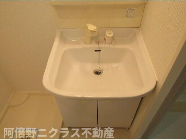 エス・キュート上本町イーストの洗面所
