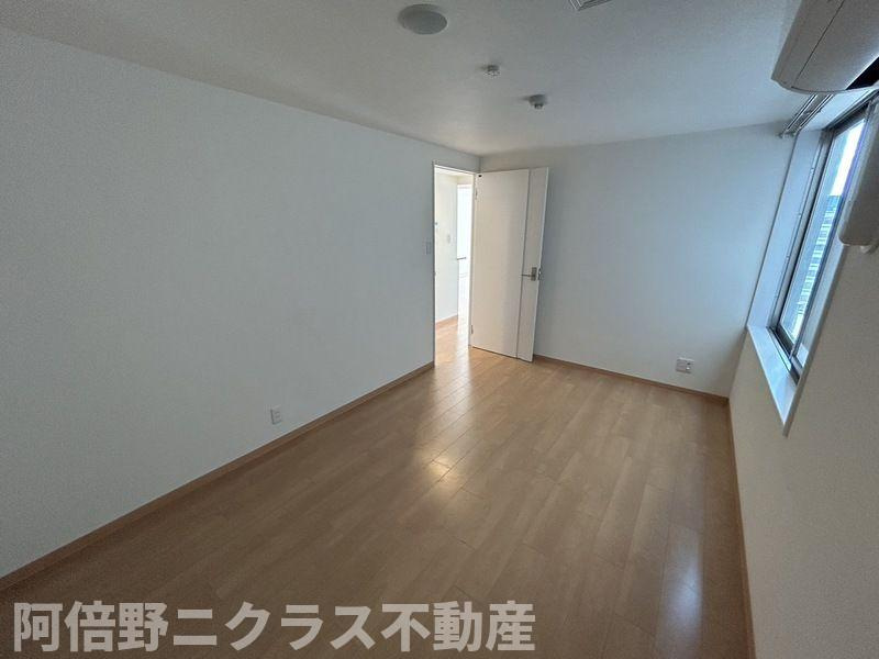オブリオポルタ上町台の洋室