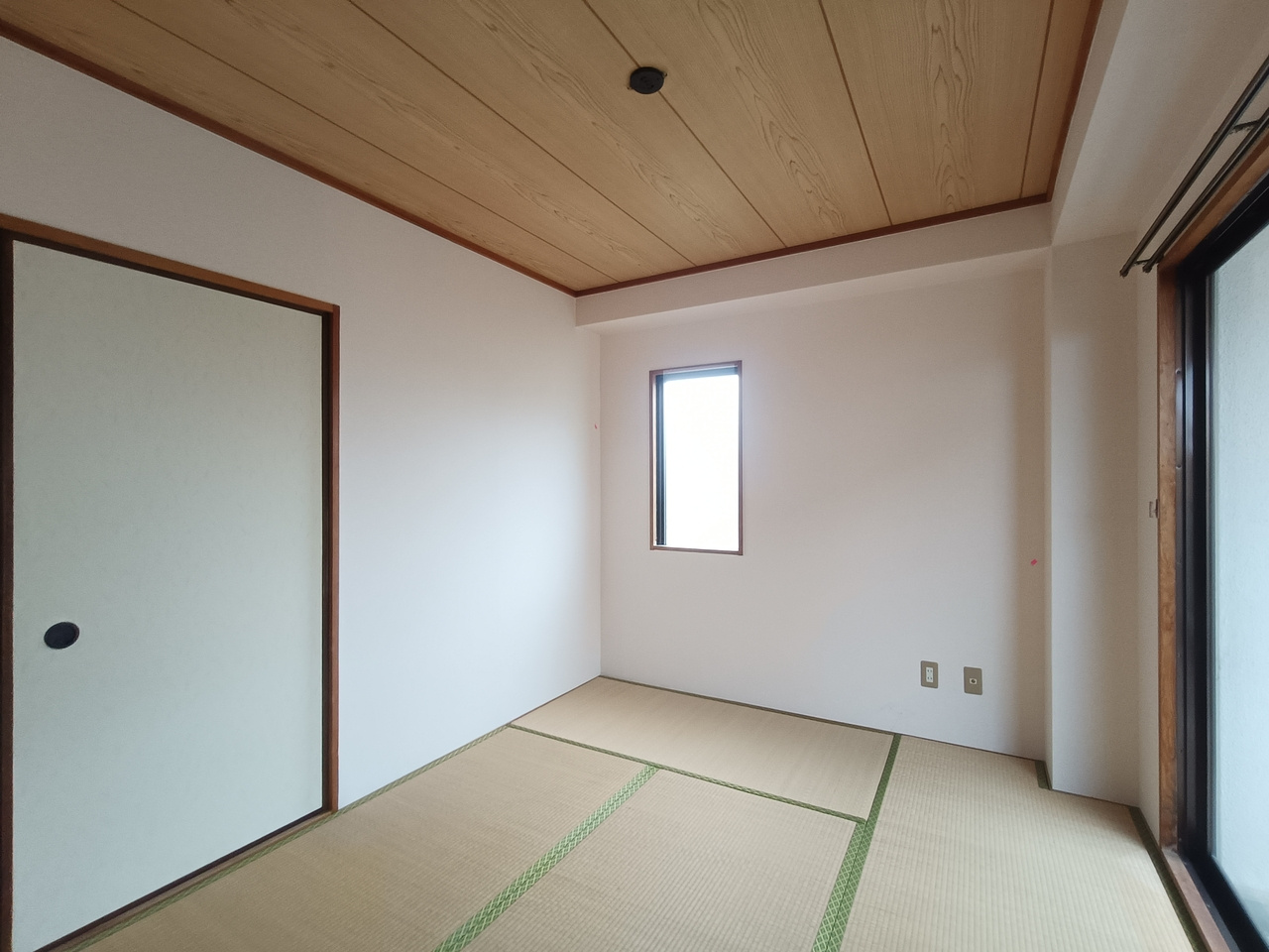 相楽郡精華町光台６丁目のアパートの寝室