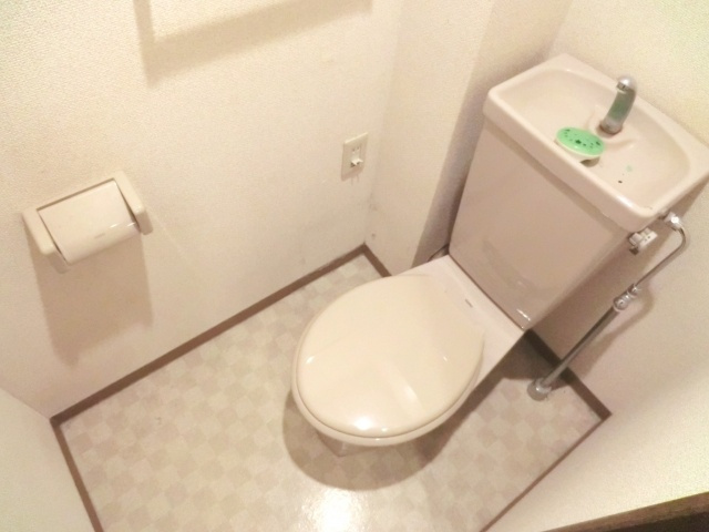 ロイヤルヒルズ高砂のトイレ|※別号室の参考写真です