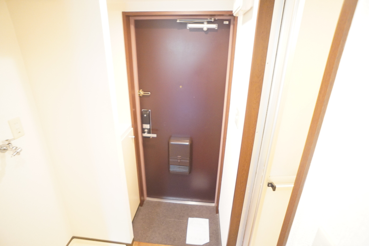 シティパレス富雄北の玄関