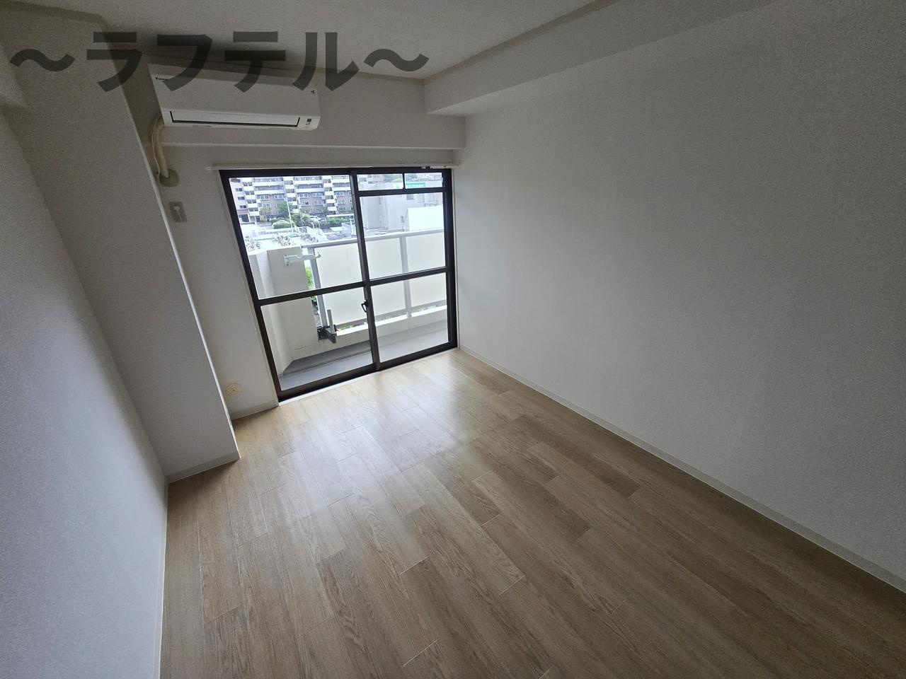 入間市駅前ビルの居間・リビング|別部屋イメージ写真