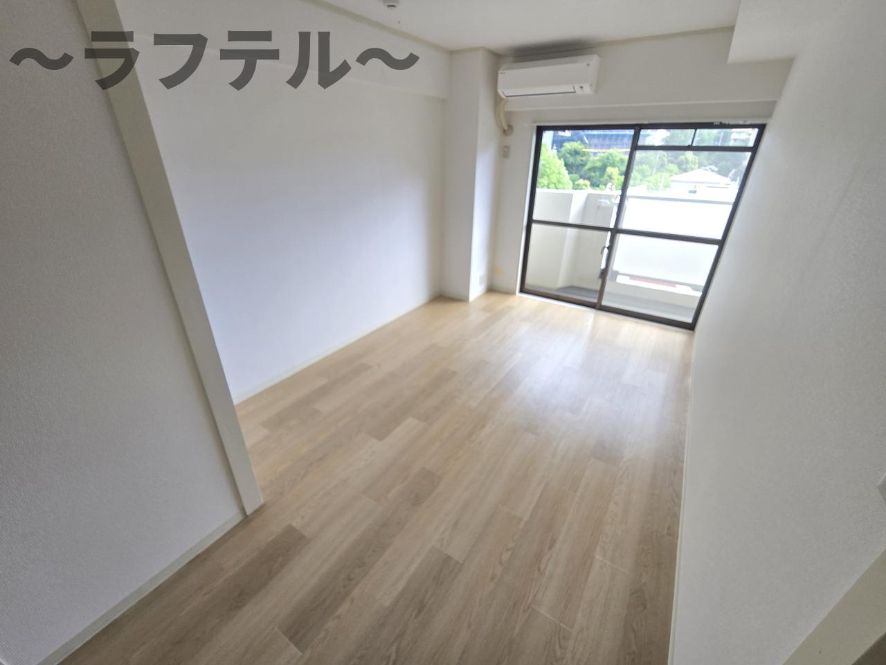 入間市駅前ビルの居間・リビング|別部屋イメージ写真