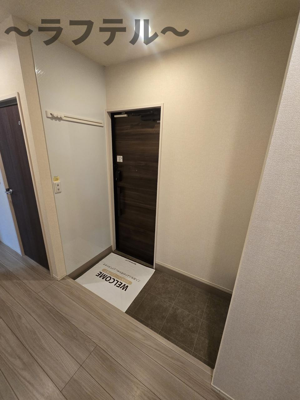 ソレイユ町屋の玄関