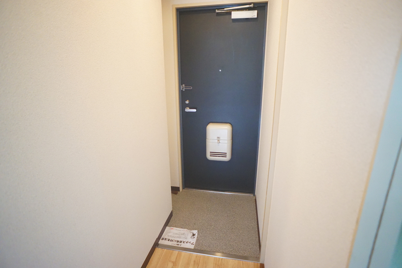 カーサグランデオカモトの玄関