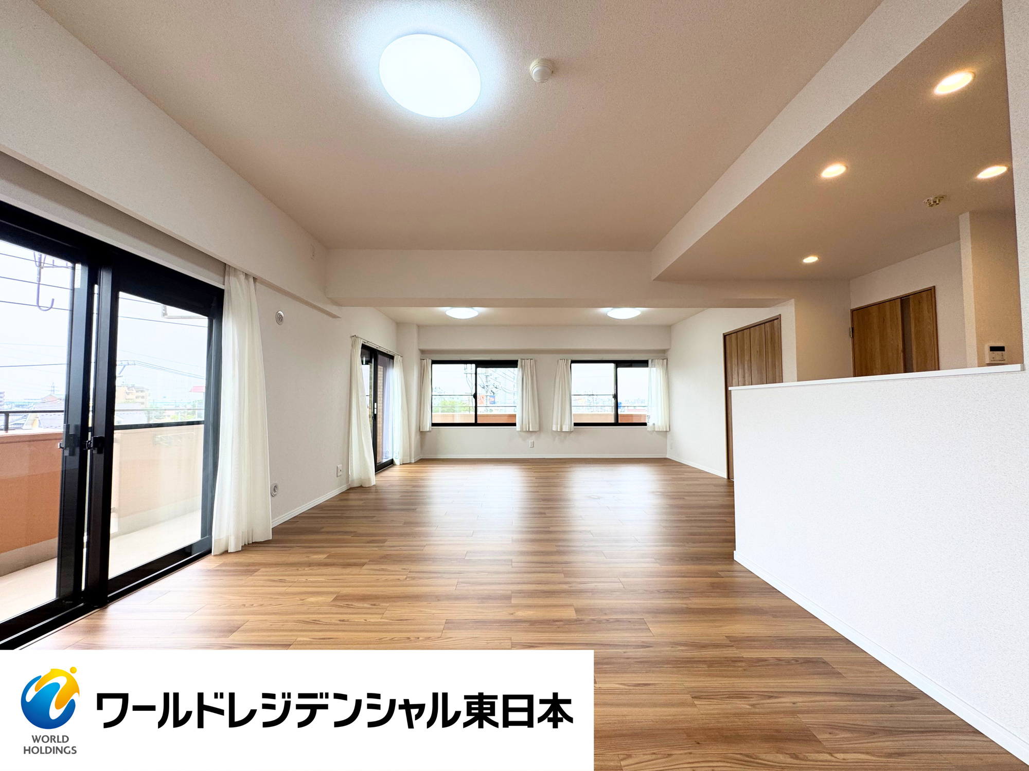 ネオハイツ中野栄の居間・リビング|約22.2帖の広々したLD
