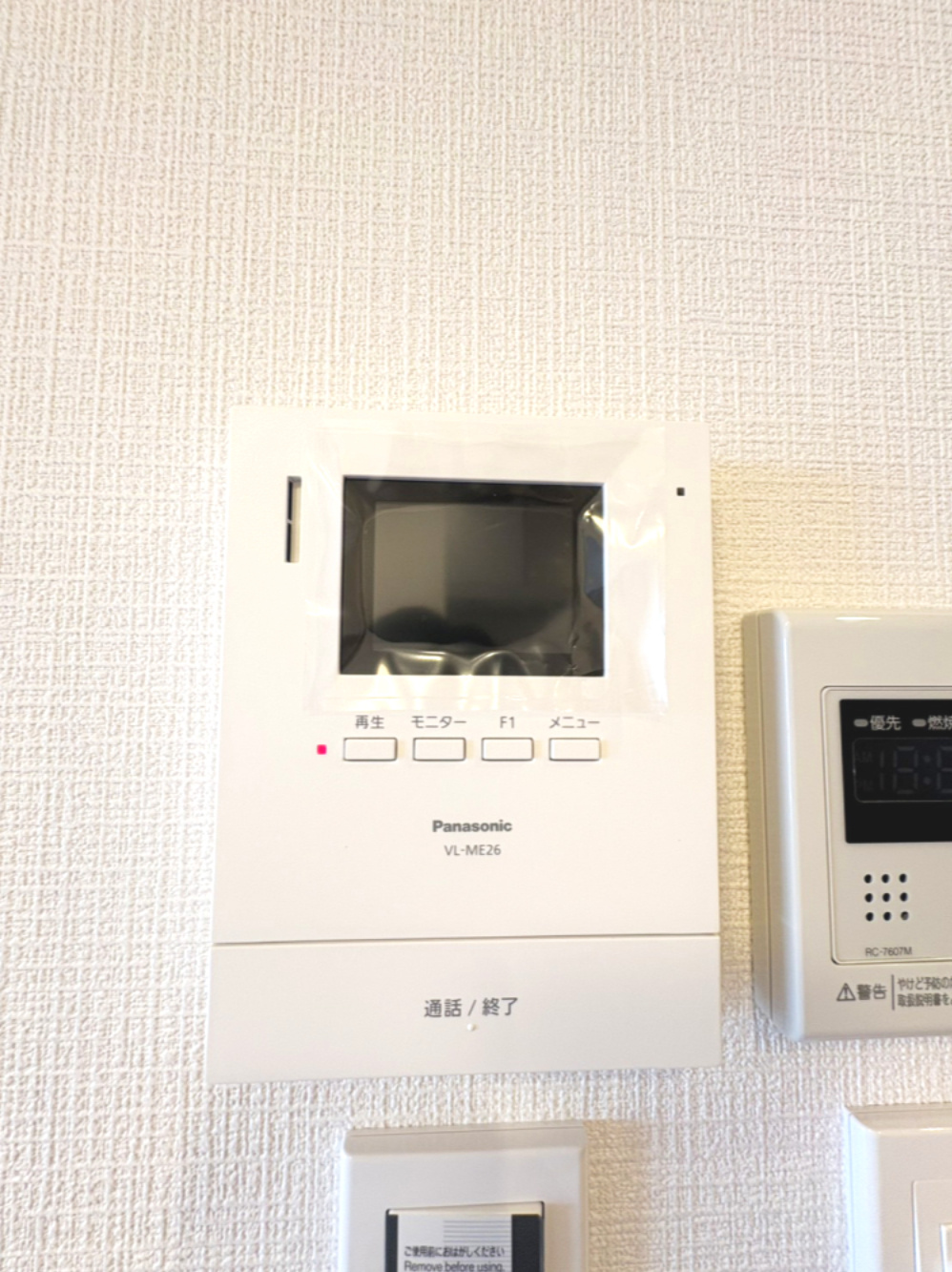 日商岩井高槻マンションの防犯設備|モニター付きインターホンです。