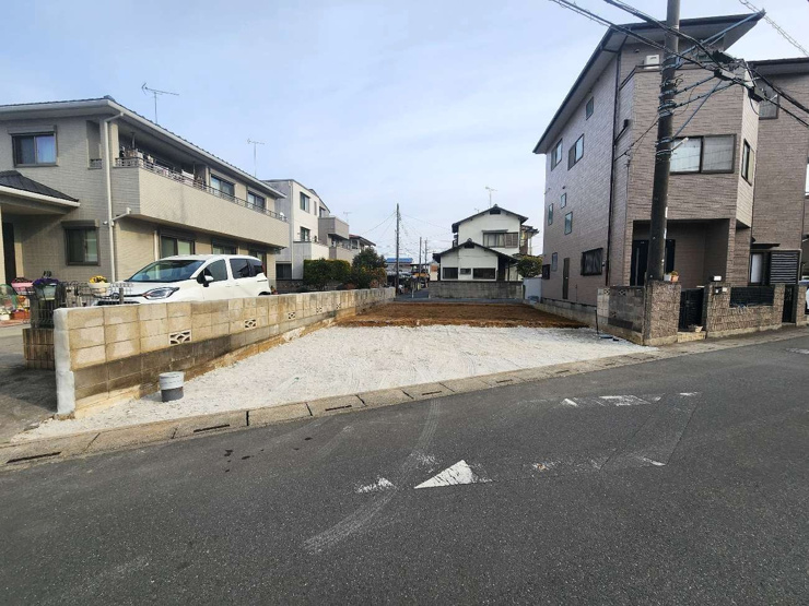 北西から