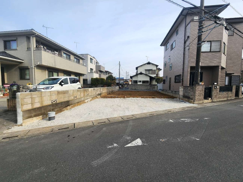 北西から