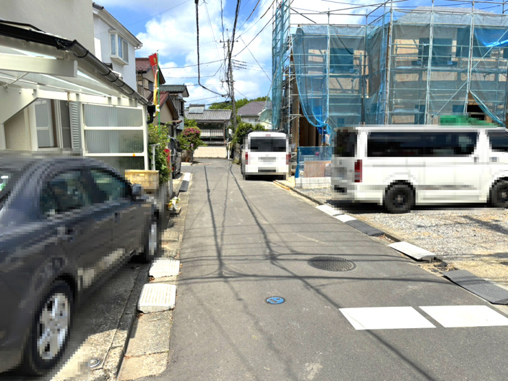 取手市新取手2丁目　1号棟　前面道路を含む現地写真