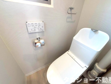 高洲三丁目住宅　19号棟のトイレ|落ち着いた色調のトイレです