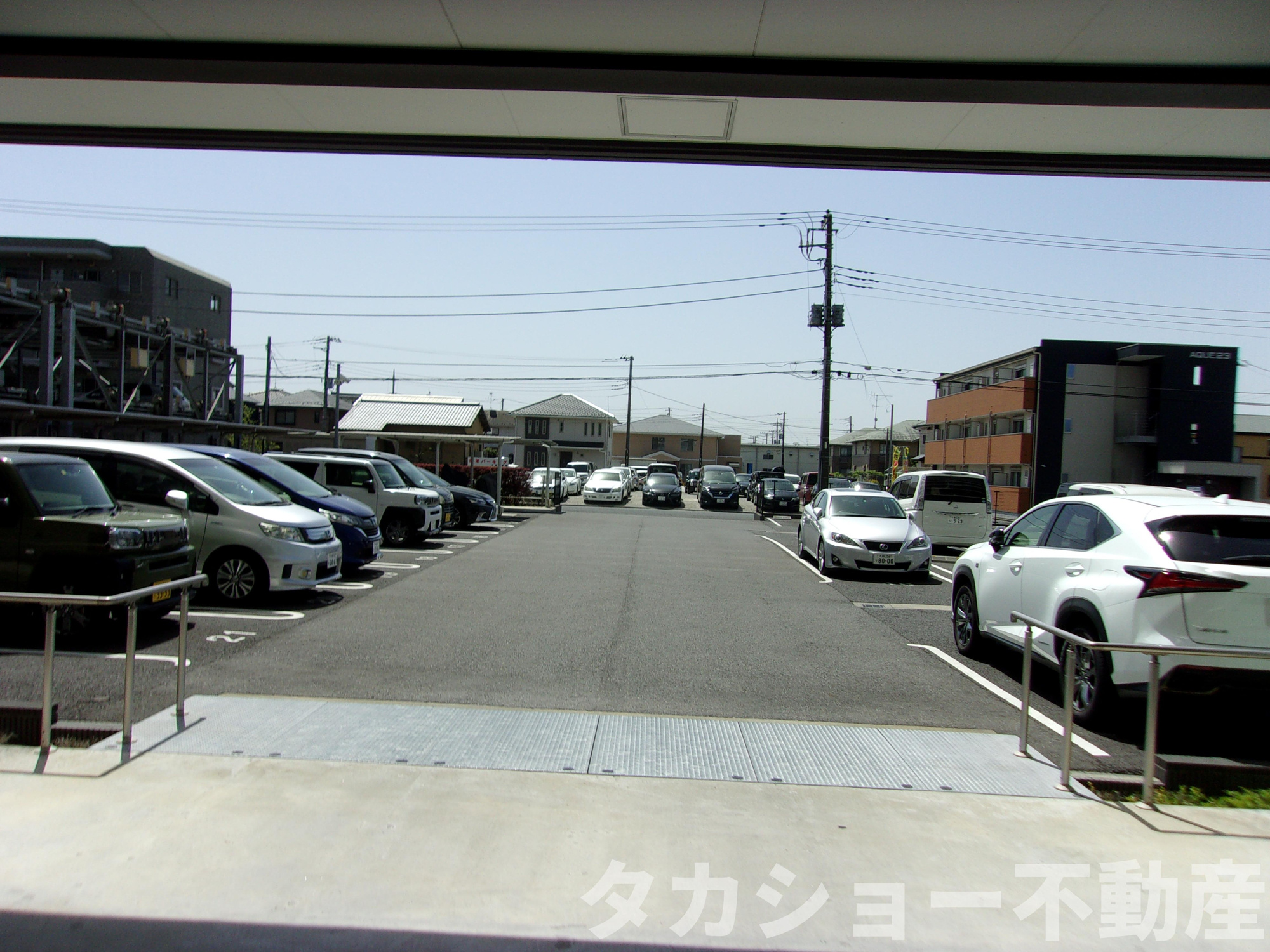 ウィザースレジデンス浜野駅前の駐車場