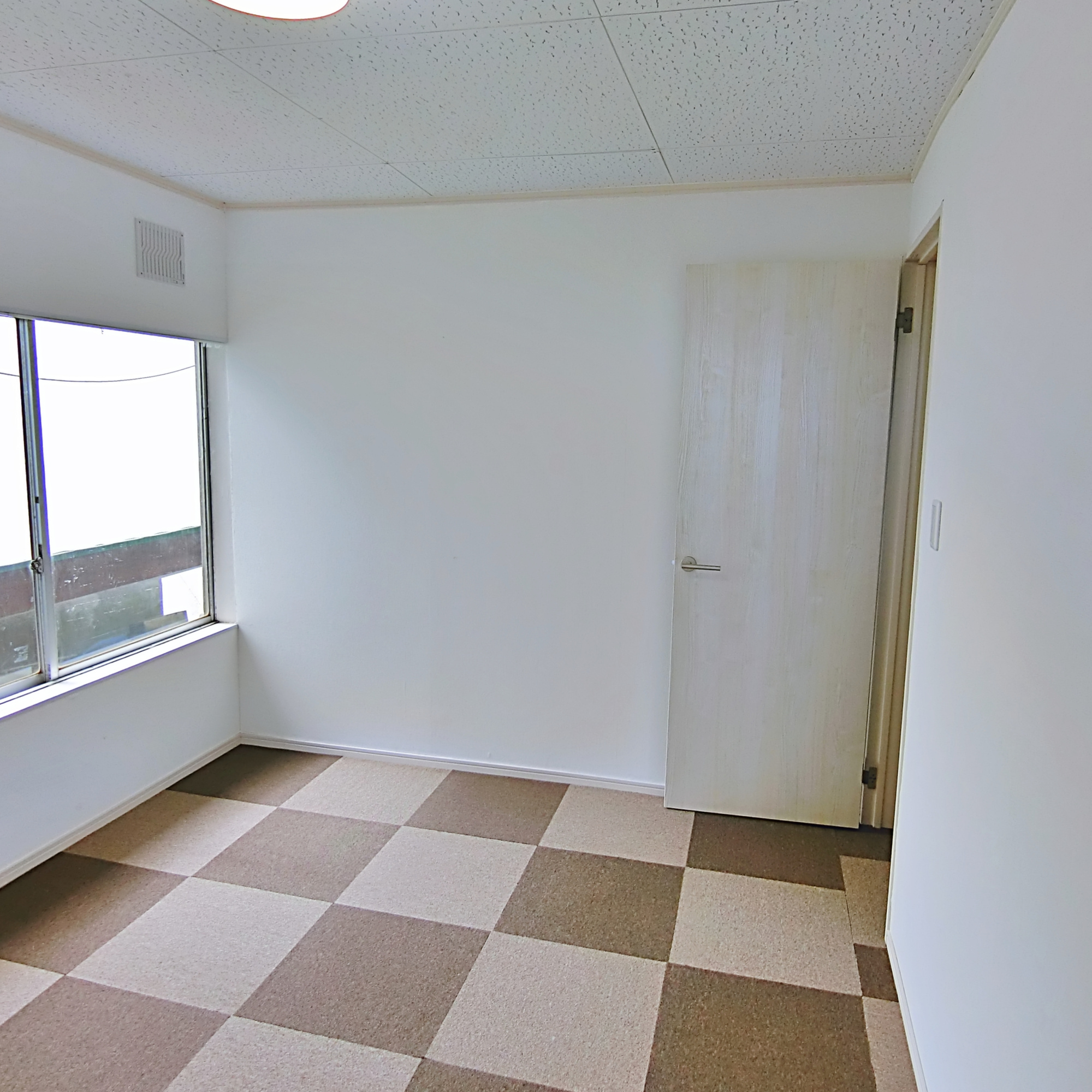 室蘭市中島町3丁目23-8_店舗付共同住宅の洋室