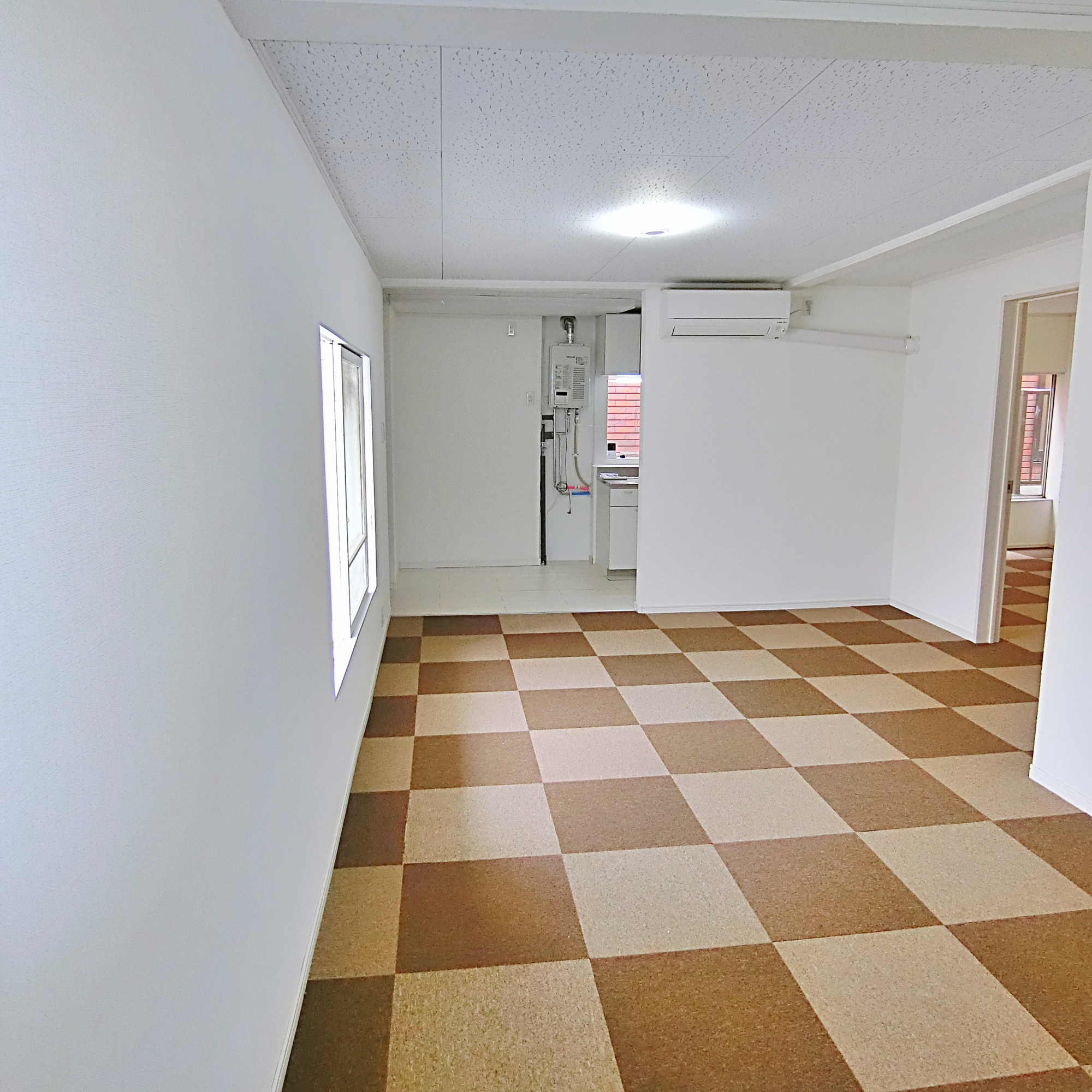室蘭市中島町3丁目23-8_店舗付共同住宅の居間・リビング