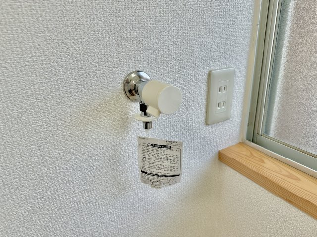 前橋市龍蔵寺町　中古住宅の設備|コンパクトですっきりと収まる洗濯用水栓。